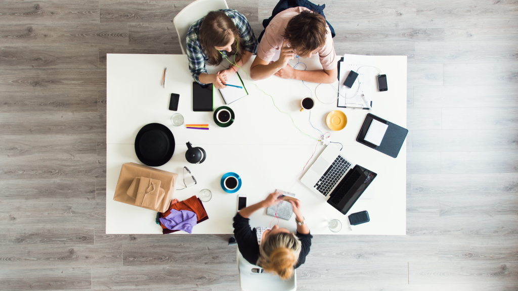 stock-footage-mixed-race-group-of-people-aerial-view-timelapse-hipster-office-small-business-start-up-company